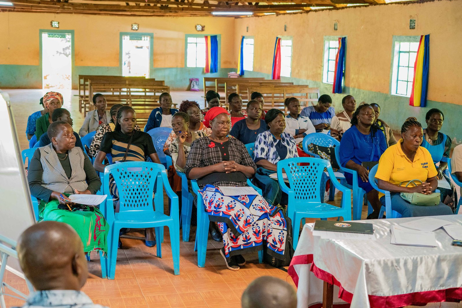 Women participating in a community enterprise meeting