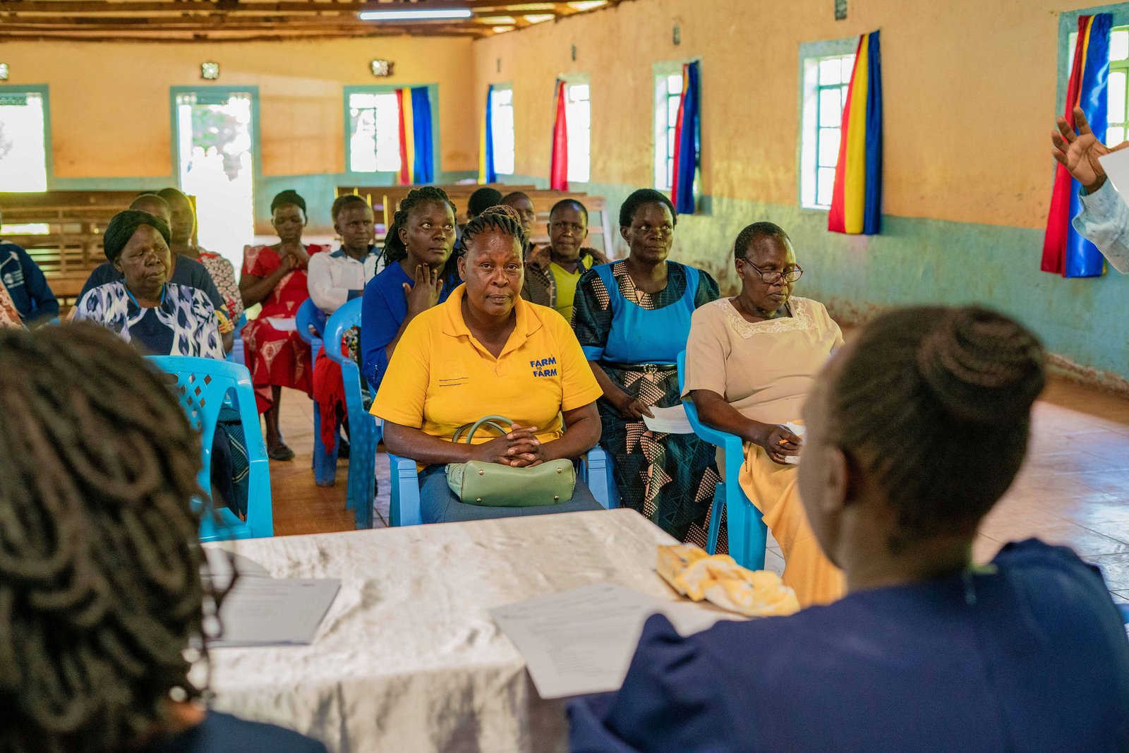 Women participating in community development