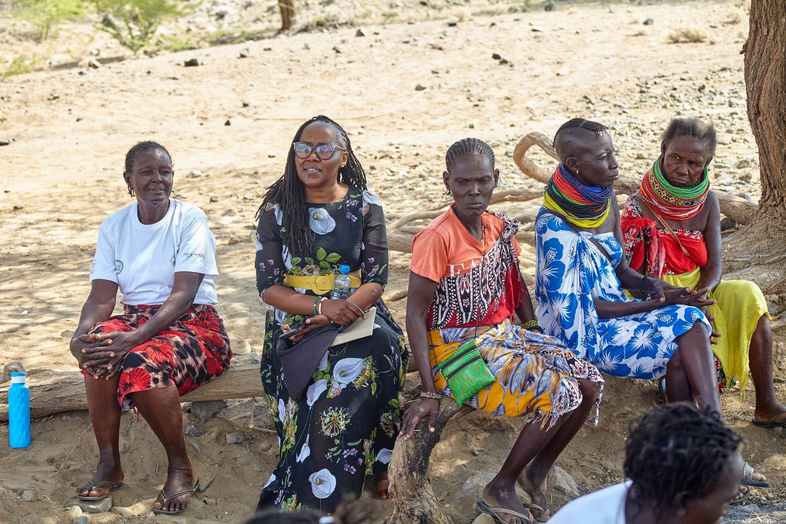 Women exchanging ideas during training